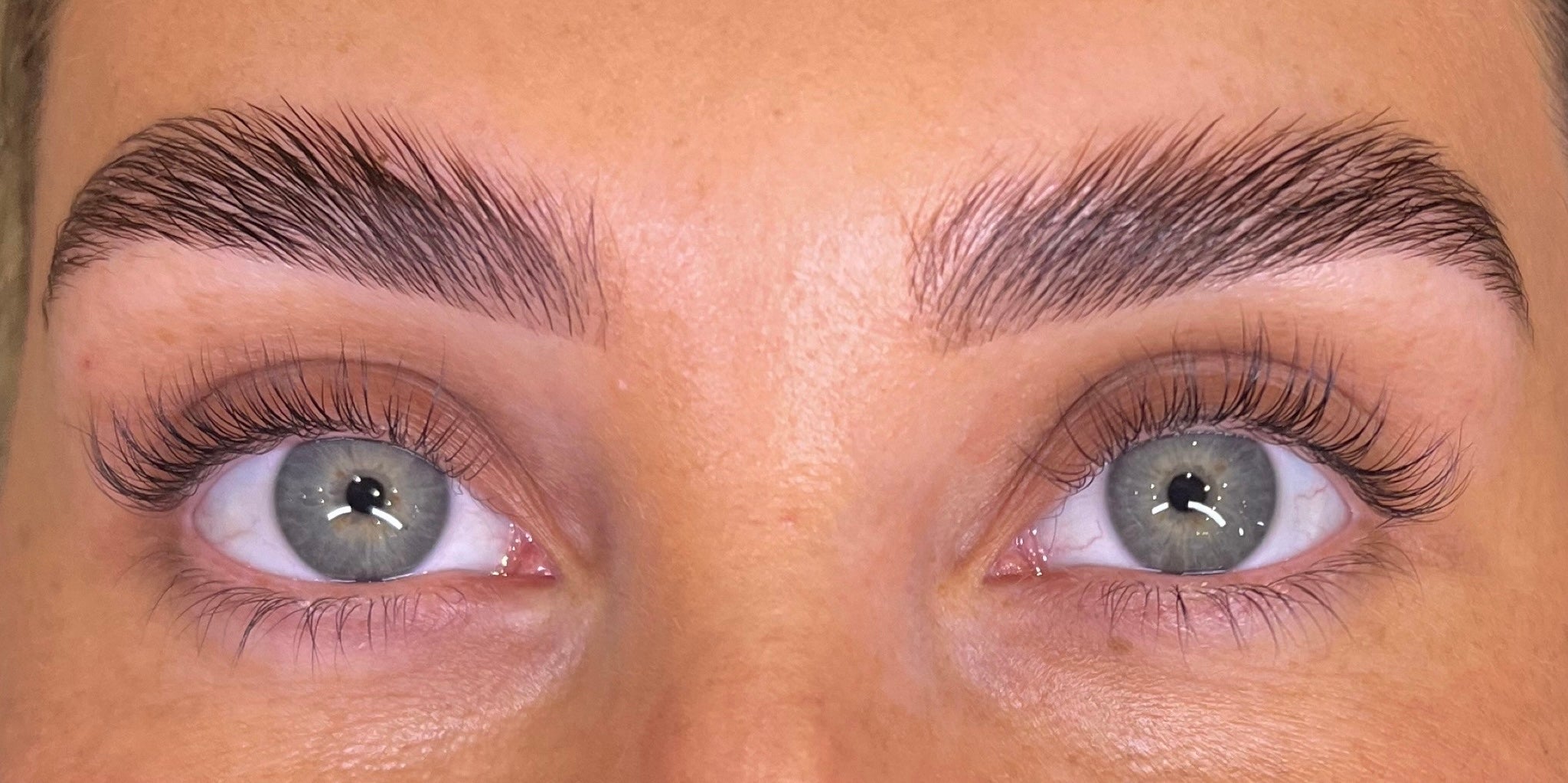 After using Purely Lashes Eye Lash Growth Serum, her eyelashes are longer, fuller, and healthier.