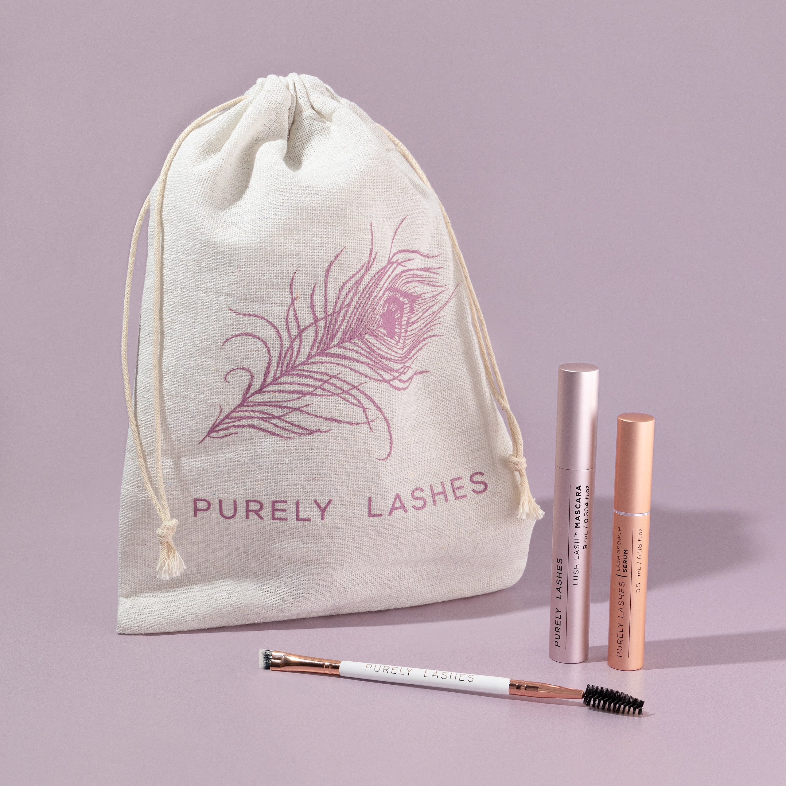 Lash Growth Mascara and Growth Serum on a pink background
